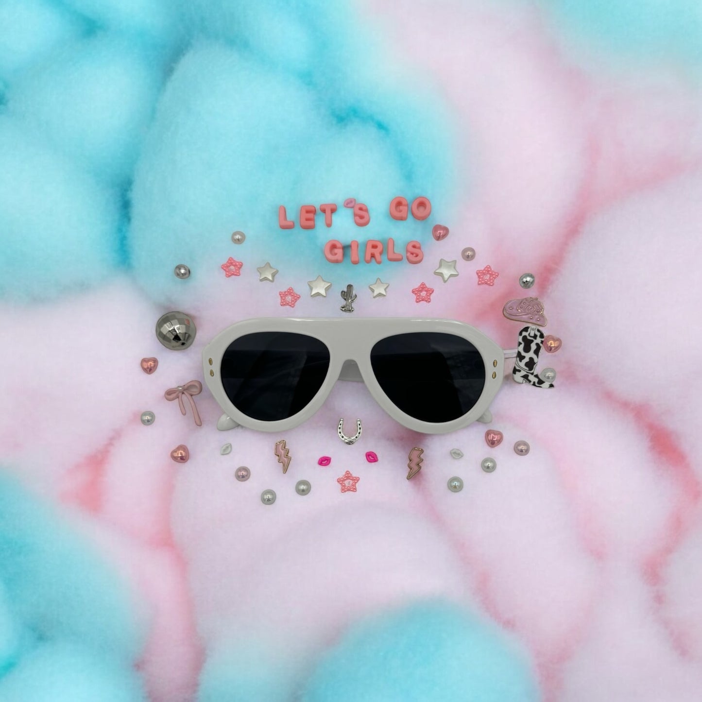 White retro aviator sunglasses shown with charms