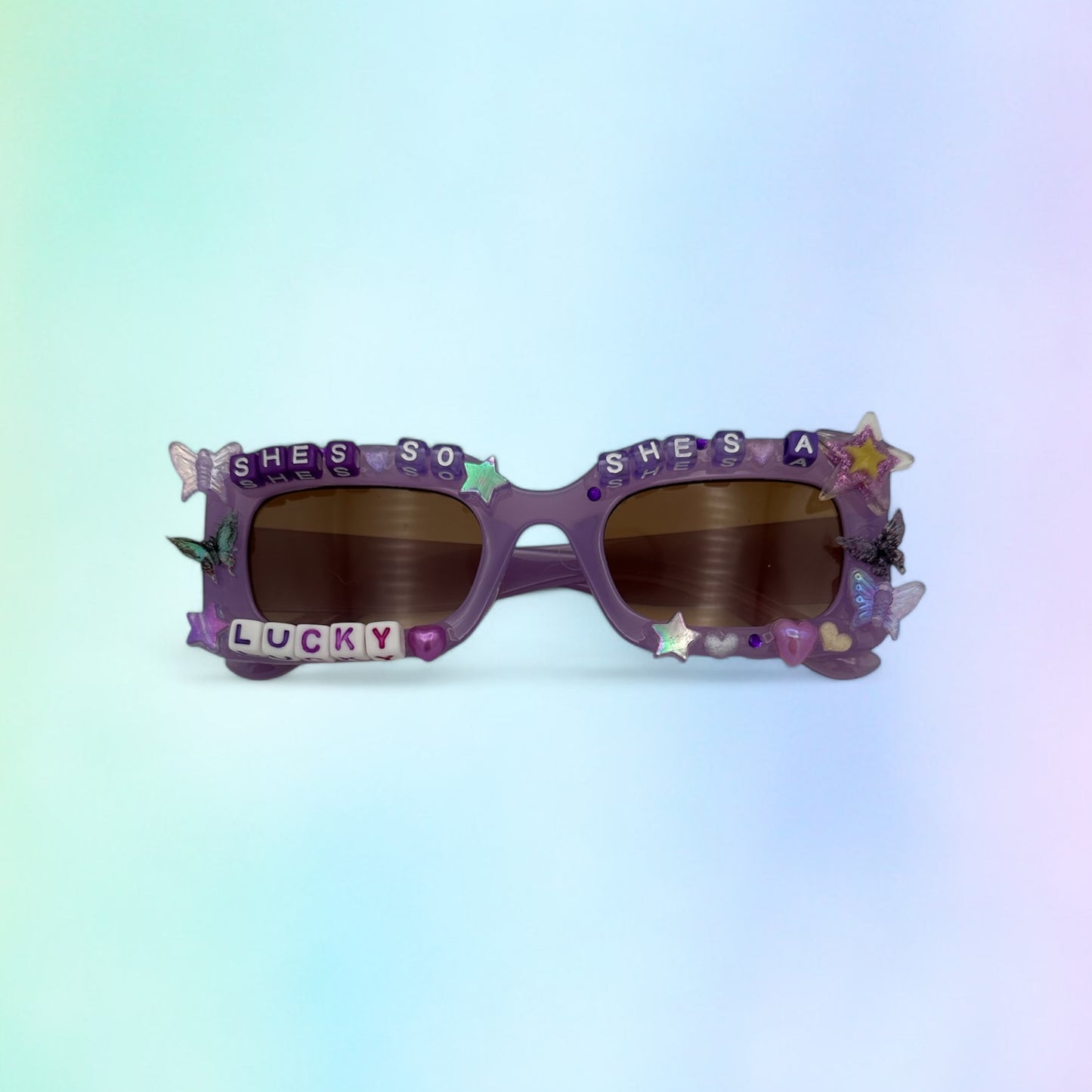 Purple rectangle sunglasses with stars and butterflies