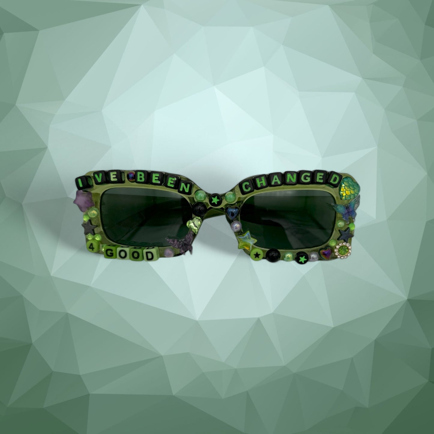 Green rectangle sunglasses with green and black stars gems