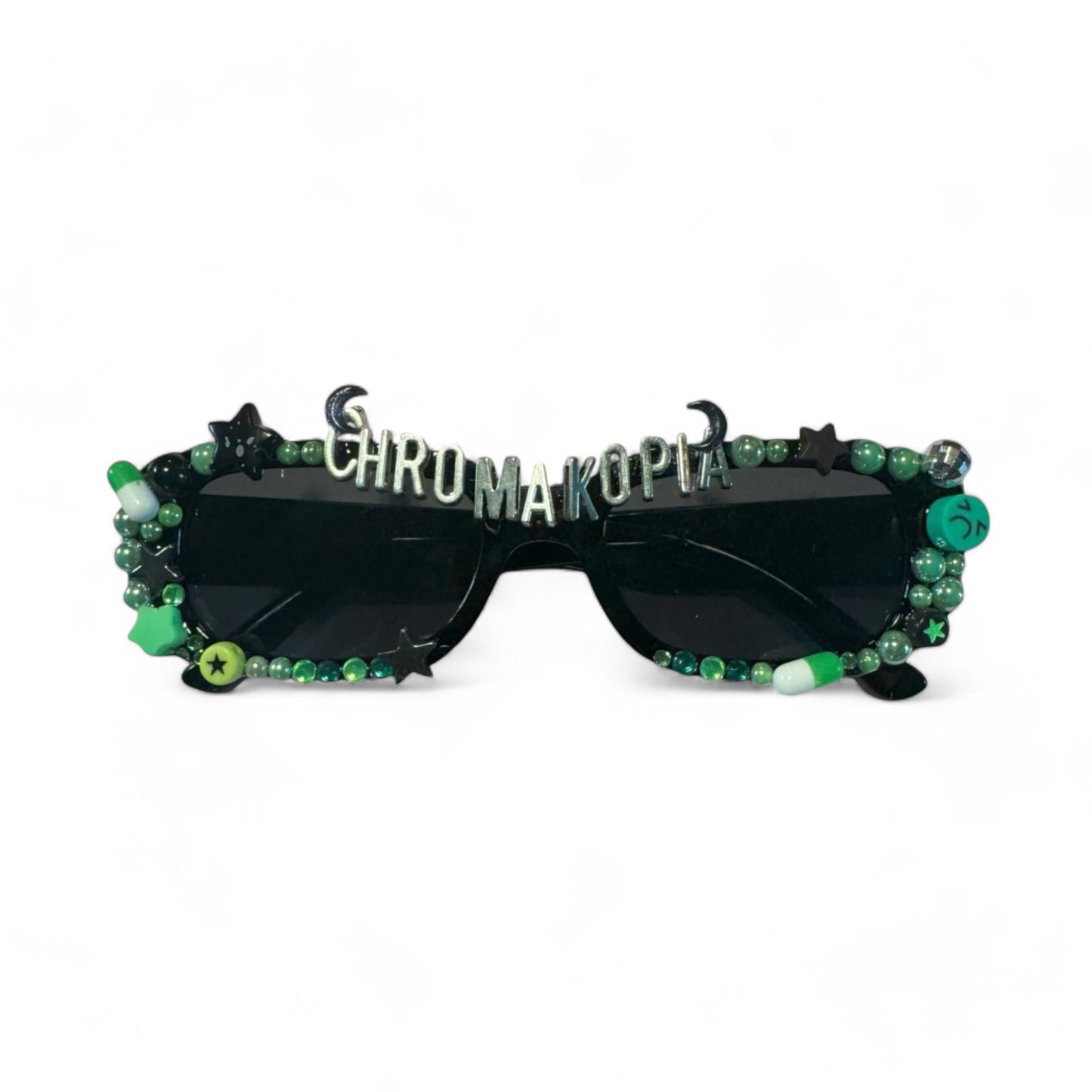Black rectangle sunglasses with green and gold embellishment