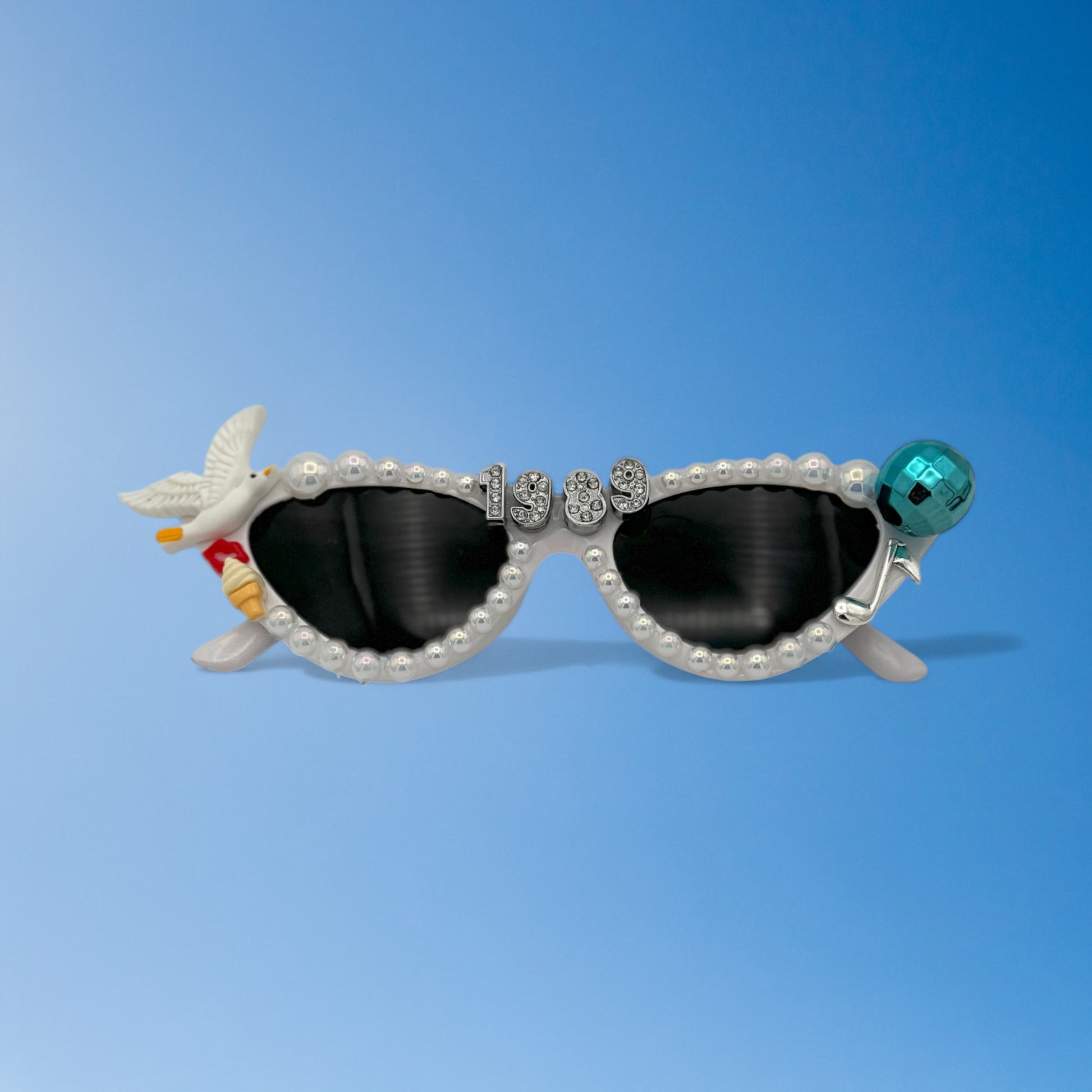 White cat eye sunglasses with seagull and disco ball