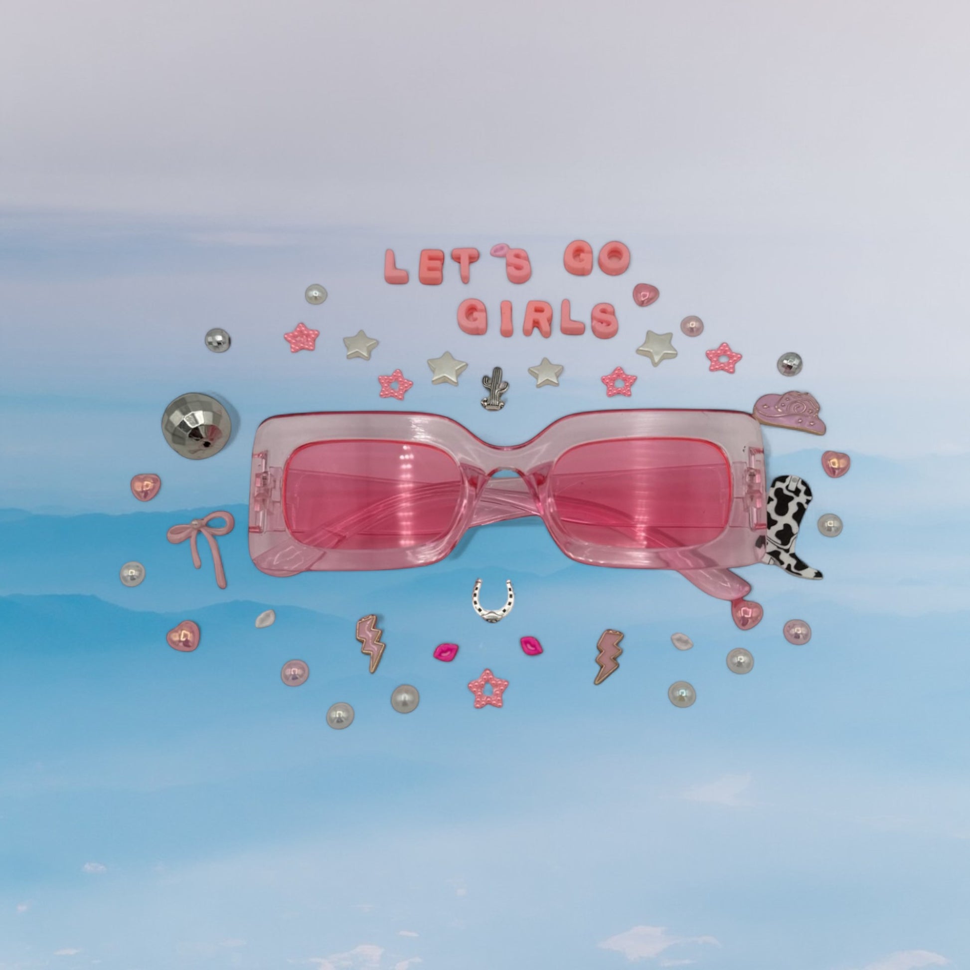 pink rectangle sunglasses shown with charms