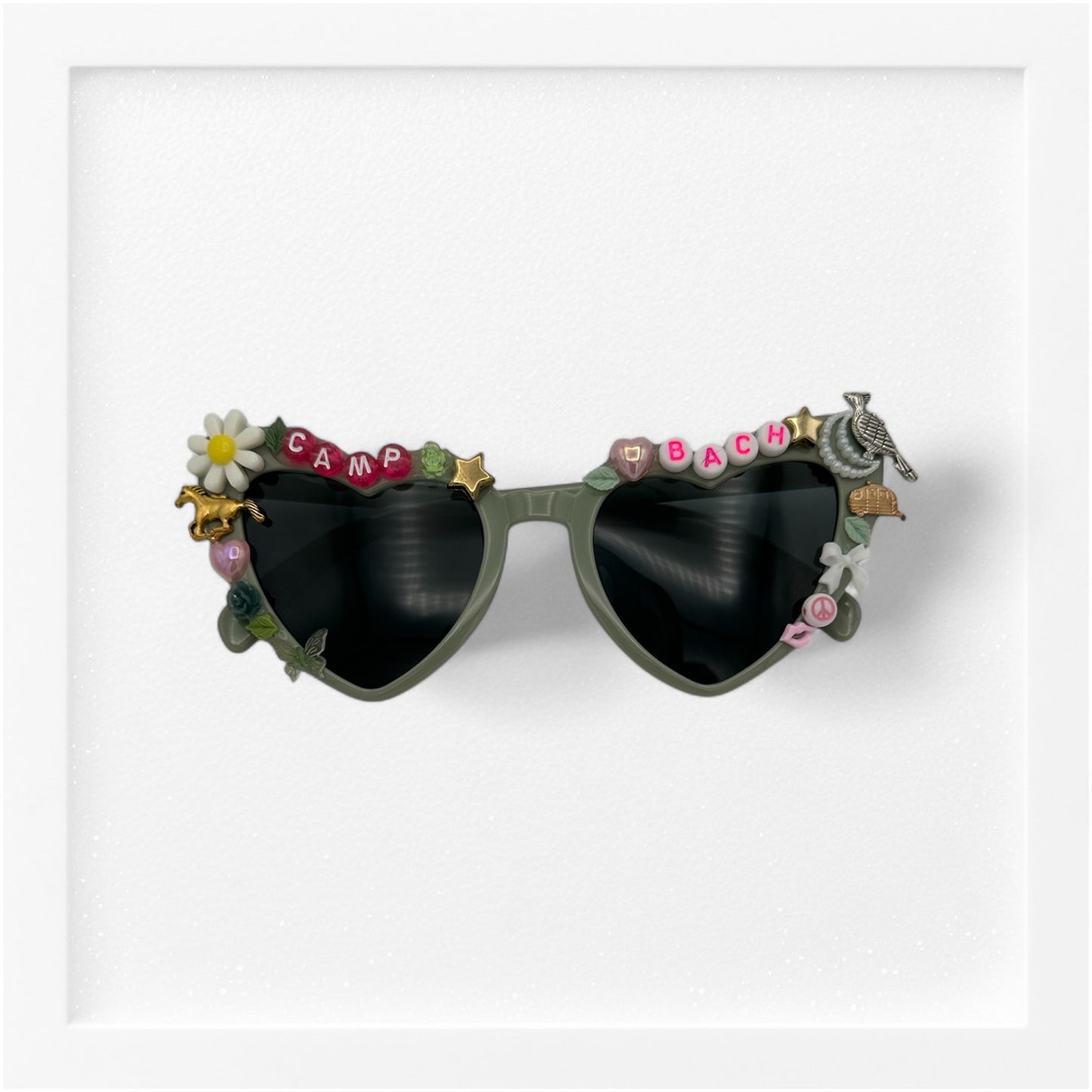 Green heart sunglasses with camp theme charms glued on