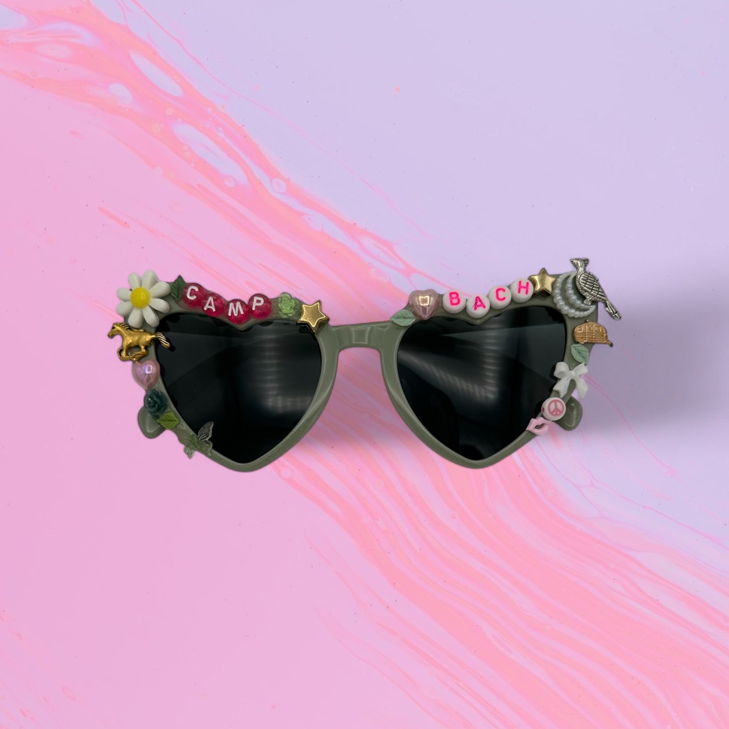 Green heart sunglasses with camp theme charms