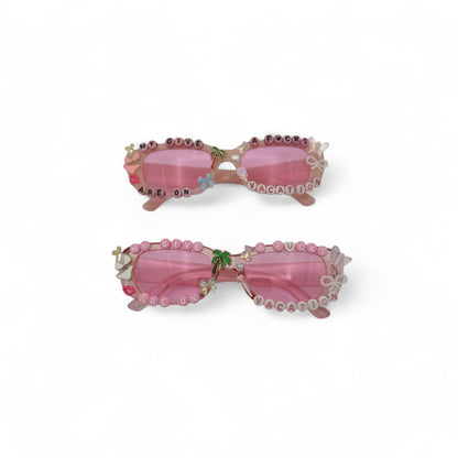 Narrow pink rectangle sunglasses w beach charms