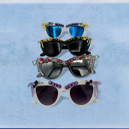 Cat eye sunglasses in blue, black, silver and white