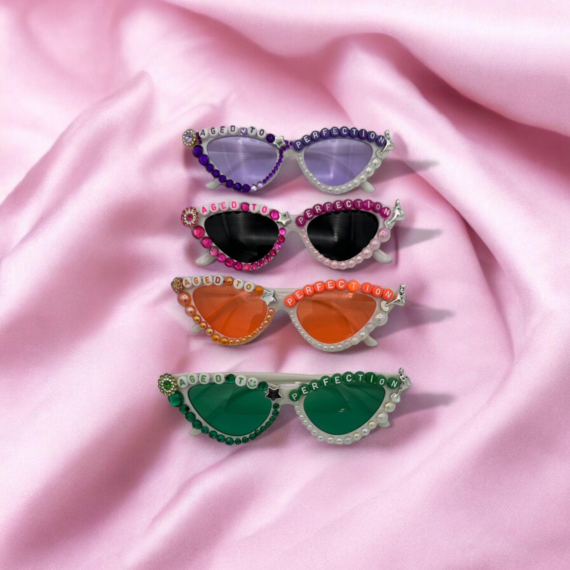 4 pair of white cat eye bedazzled birthday sunglasses