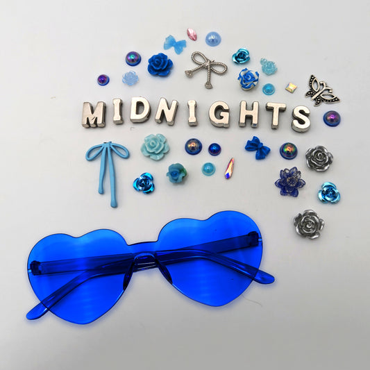 Blue heart sunglasses show with blue/silver midnights charms