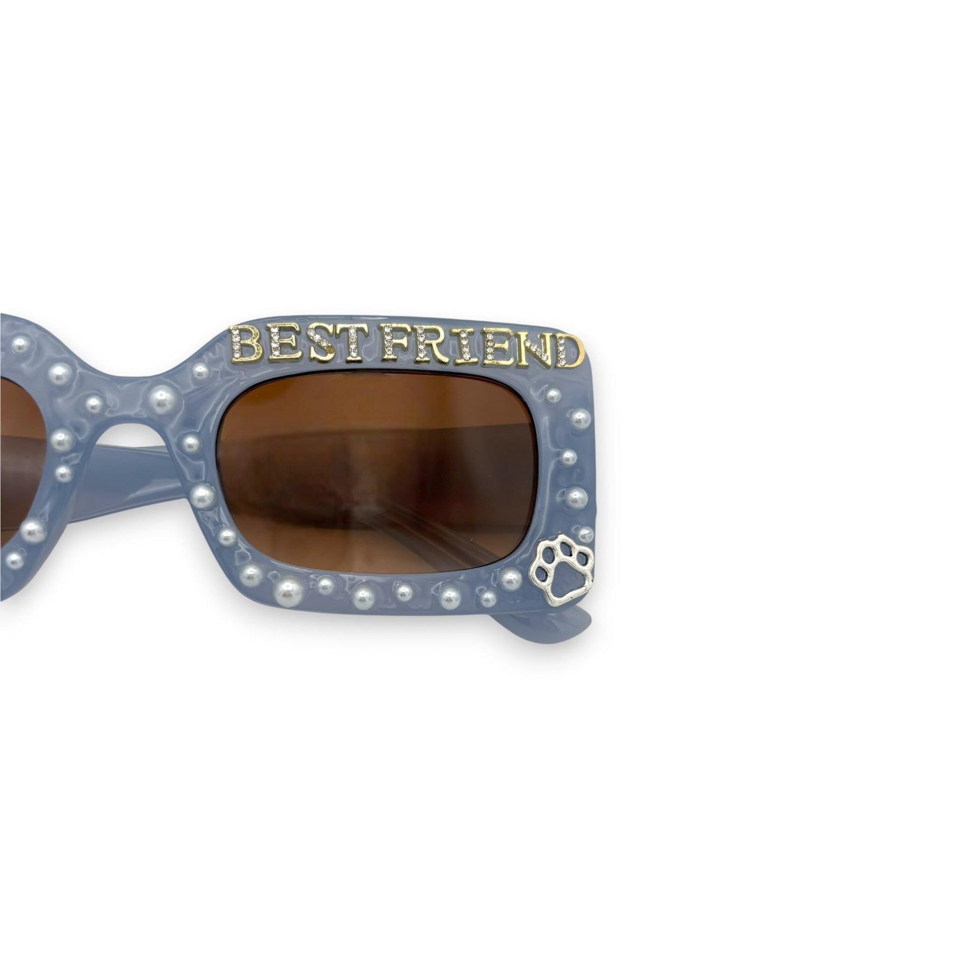 Sunglasses with 'BEST FRIEND' and paw print design on a white background