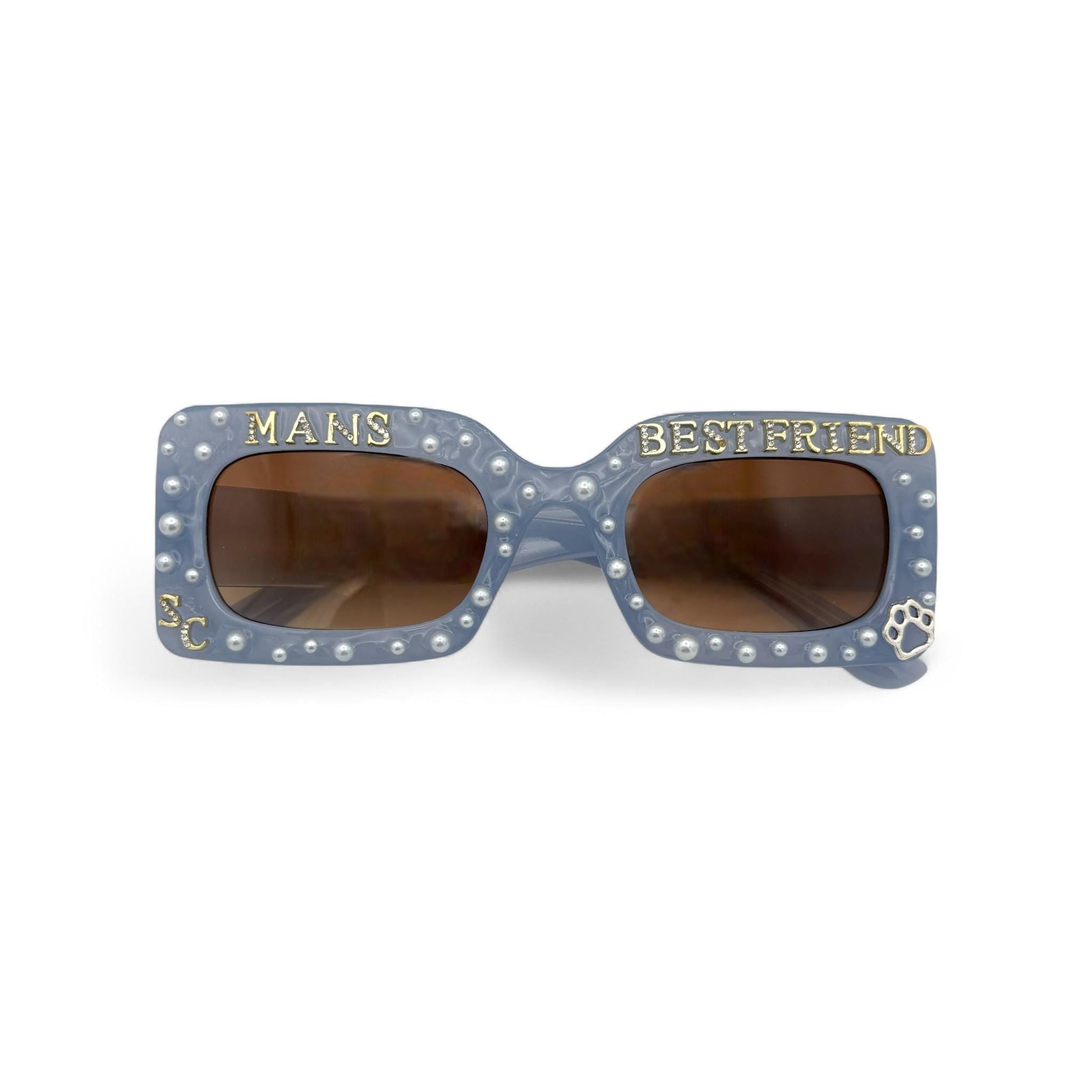Sunglasses with 'Mans Best Friend' text on a white background