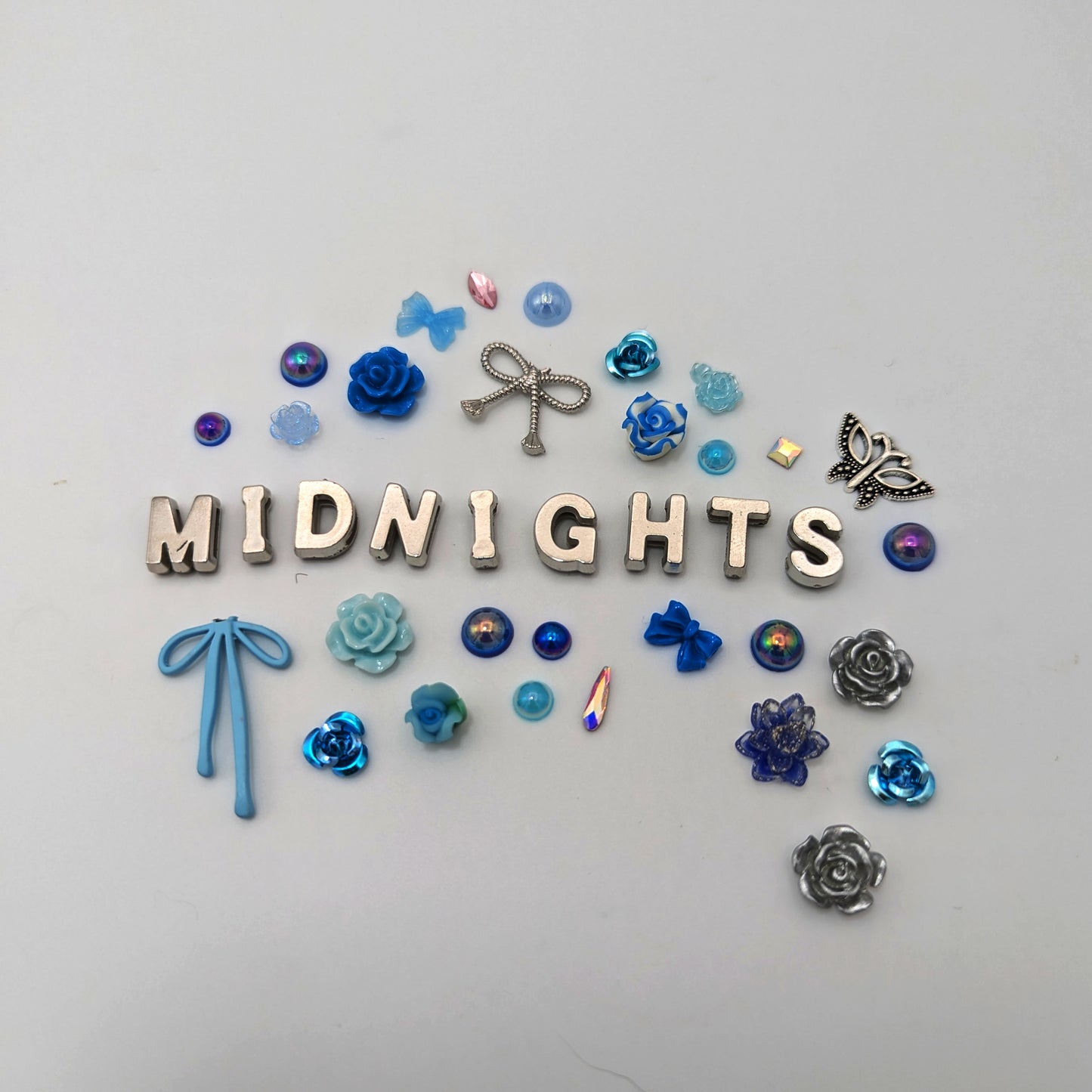 Coquette style blue/silver midnights charms